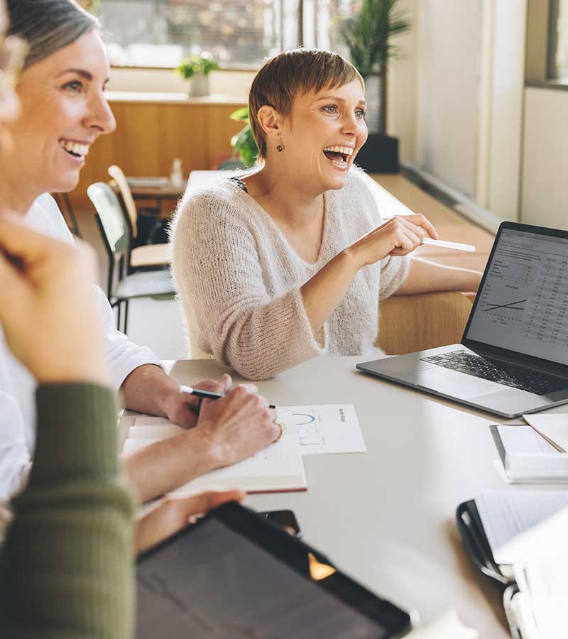 business woman happy with tech forward IT guarantee